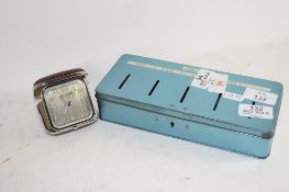 METAL MONEY BOX AND A TRAVELLING ALARM CLOCK