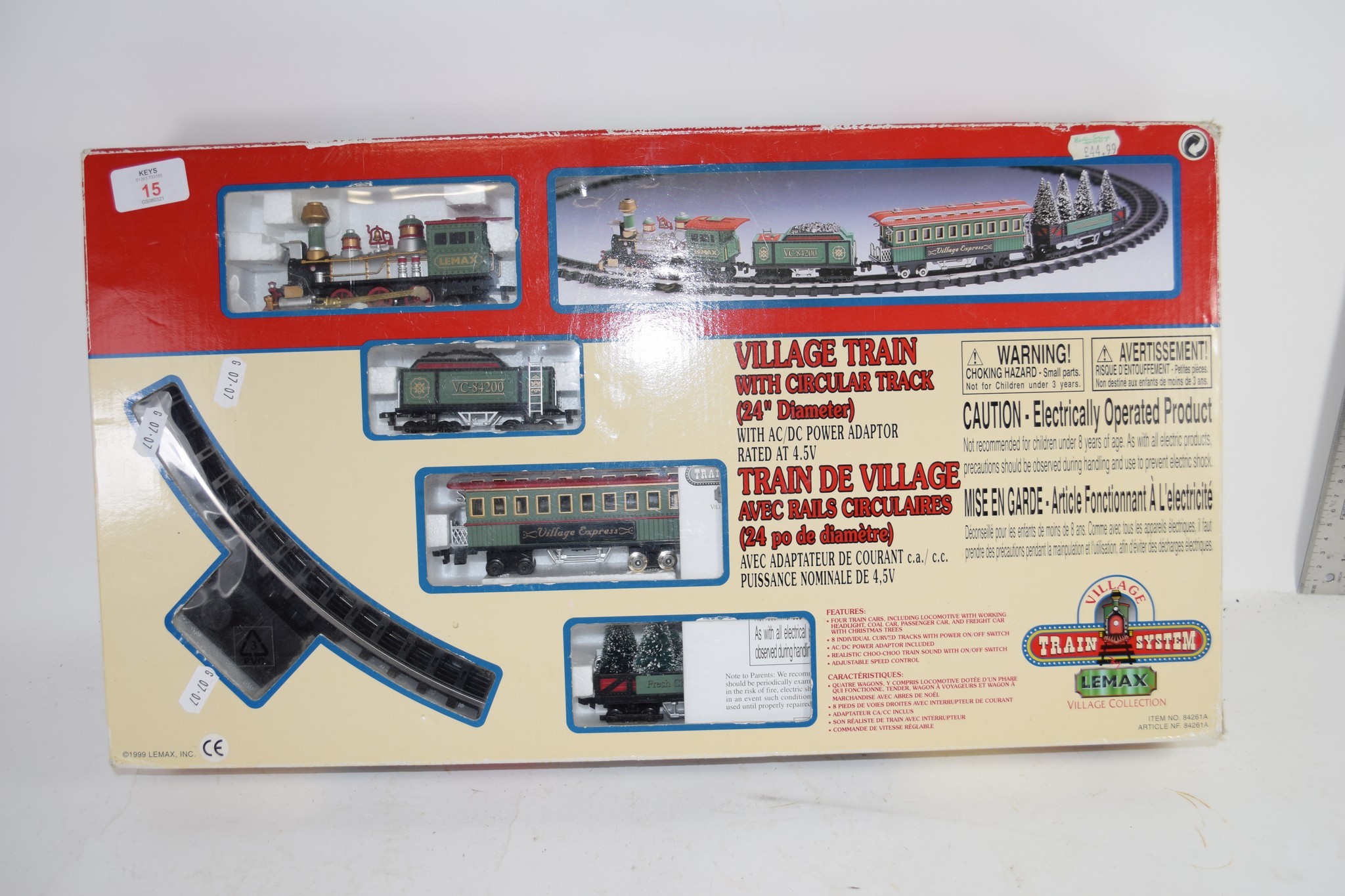 BOX CONTAINING A VILLAGE TRAIN SET WITH TRACK