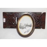 WOODEN BOOK ENDS AND A PICTURE IN OVAL WOODEN FRAME