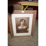 PRINT OF A LADY IN WOODEN FRAME