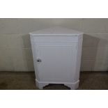 SMALL WHITE PAINTED LOW CORNER CABINET, WIDTH APPROX 65CM MAX