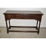 EARLY 20TH CENTURY OAK SIDEBOARD OR BUFFET WITH CARVED DECORATION AND INSET WITH TWO DRAWERS, LENGTH