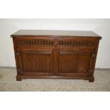 GOOD QUALITY OAK EFFECT REPRODUCTION SIDEBOARD WITH CARVED DETAIL, LENGTH APPROX 133CM