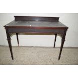 REGENCY STYLE SIDE TABLE WITH INSET LEATHER TOP ABOVE A CARVED FRIEZE OVER TAPERED LEGS, WIDTH