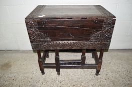 17TH/18TH CENTURY AND LATER CARVED OAK DROP LEAF TABLE WITH HEAVILY CARVED DECORATION AND