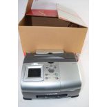 BOX CONTAINING LEXMARK PORTABLE PHOTO PRINTER