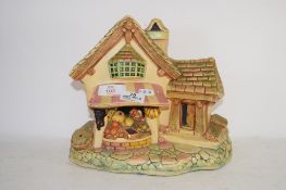 RESIN MODEL OF AN OLD COUNTRY HOUSE