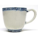 Lowestoft blue porcelain cup circa 1770 with a ribbed design with key border in underglaze border to