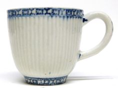 Lowestoft blue porcelain cup circa 1770 with a ribbed design with key border in underglaze border to