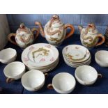 Mid-20th century Japanese porcelain tea set, the cups with a lithophane of a geisha girl in the