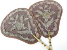 Pair of Victorian hand held face screens, the pear shaped panels with foliate bead work, Provenance: