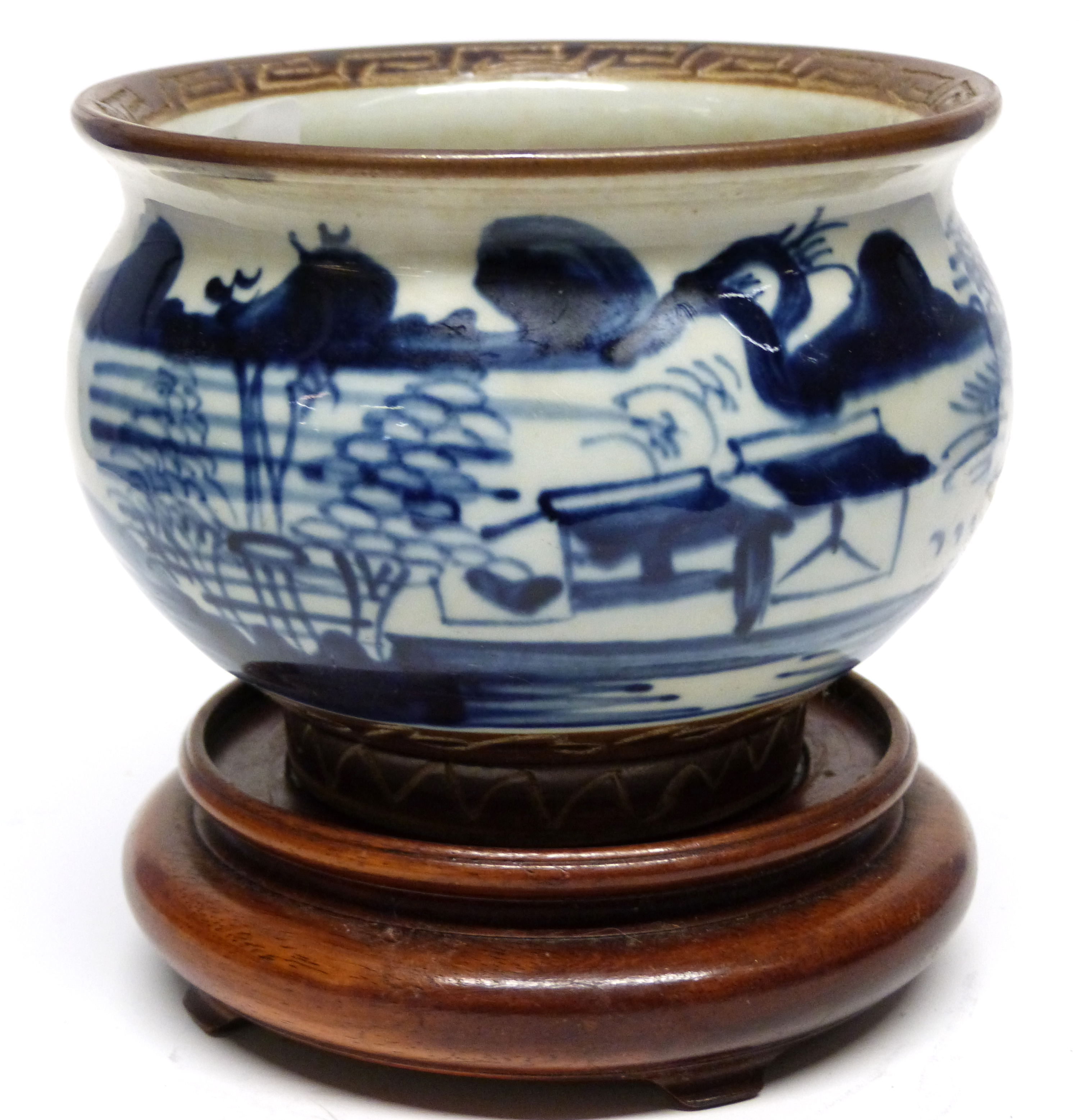 Batavia style porcelain bowl with a blue and white design within a brown glazed border, 13cm diam