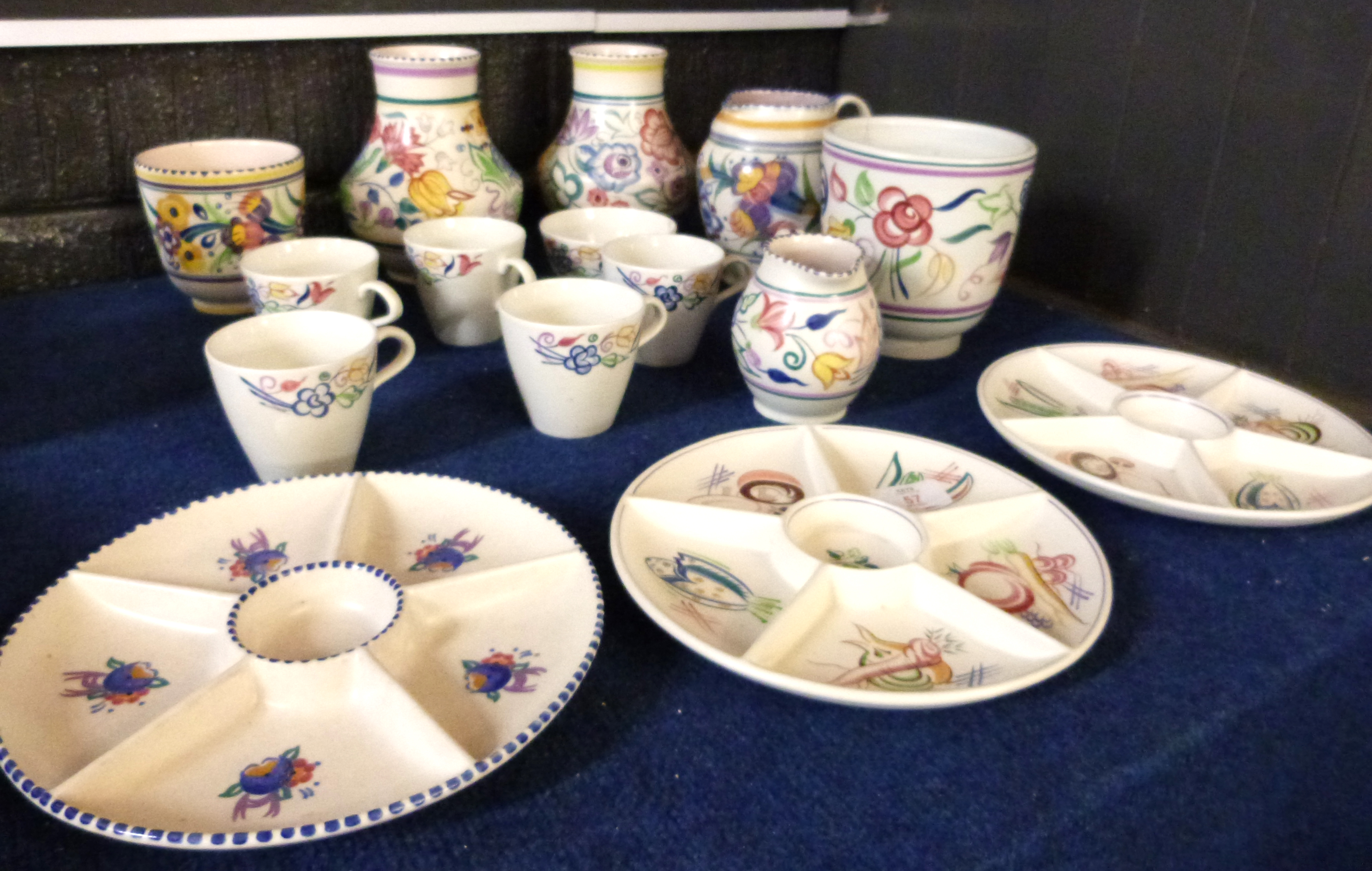 Collection of Poole wares, various jugs, vases, serving dishes, all with typical Poole floral