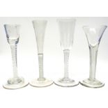 Group of four 18th century wine glasses, one air twist with drawn trumpet bowl, three further