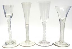 Group of four 18th century wine glasses, one air twist with drawn trumpet bowl, three further