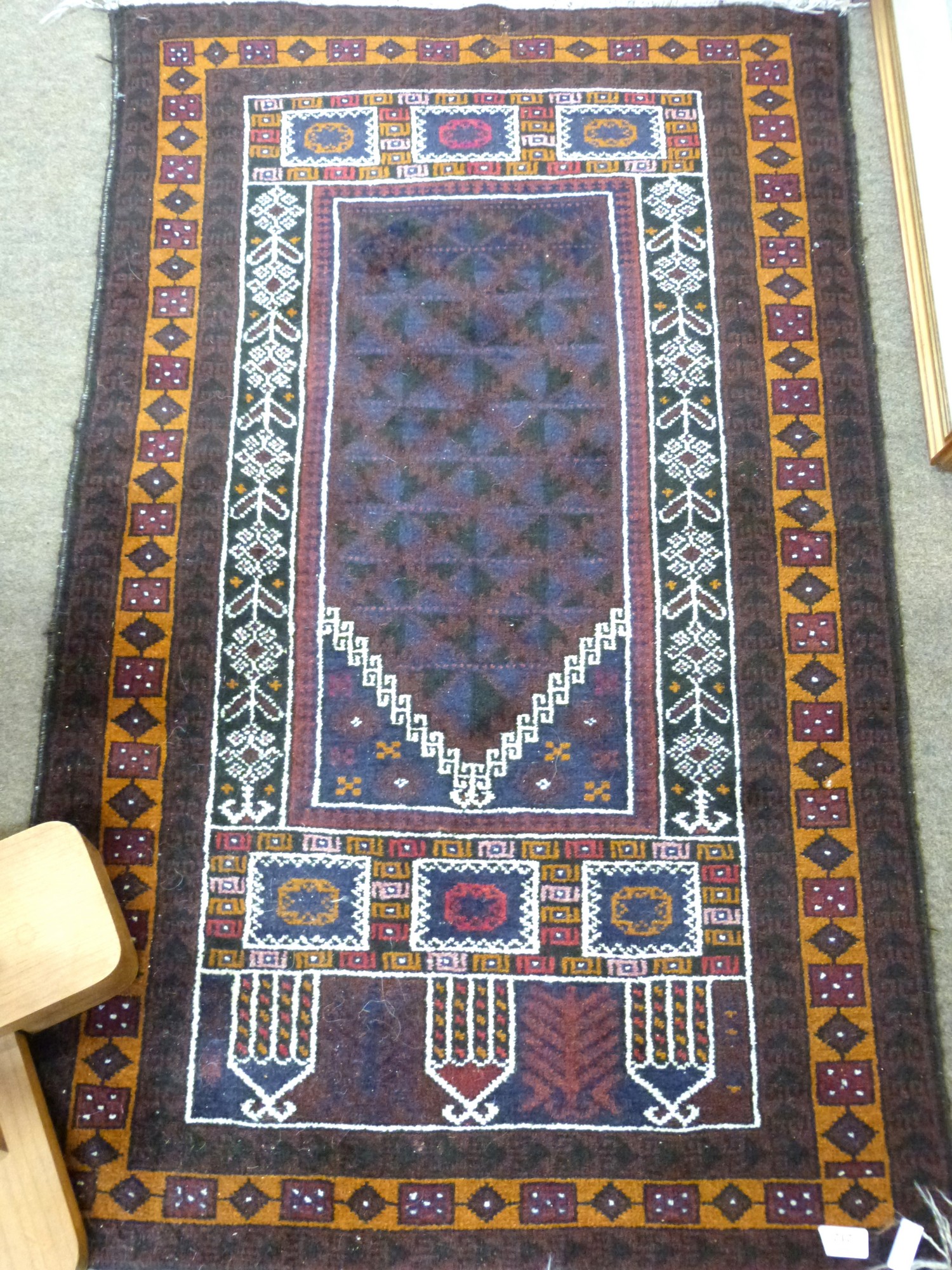 Small Iranian wool prayer rug with geometric patterns in dark blue, beige, red and orange, 130 x