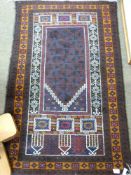 Small Iranian wool prayer rug with geometric patterns in dark blue, beige, red and orange, 130 x