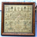 Sampler in wooden frame, worked by Sarah Morris May, 10, 1797, with typical verse and floral and