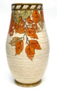 Art Deco vase by Charlotte Rhead in the Autumn leaves pattern, the base with factory mark for