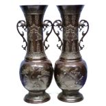 Pair of Japanese bronzed spelter vases decorated in Meiji style with birds and prunus with loop