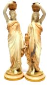 Pair of Royal Worcester water carrier figures after James Hadley, modelled as classical ladies on