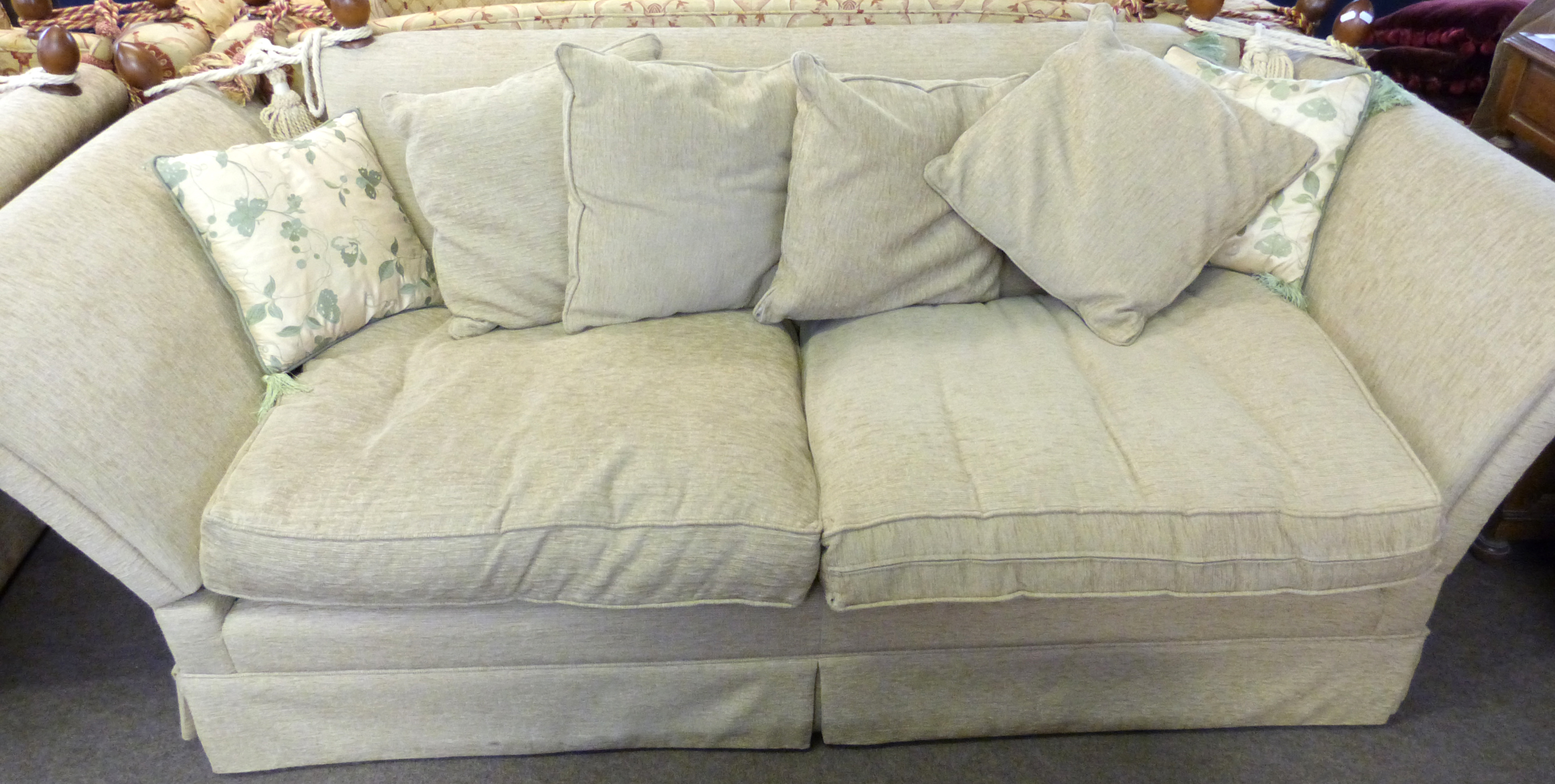 20th century Knole style two/three seater settee upholstered in beige fabric, having rope tied