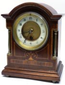 Edwardian mantel clock, the wooden case with inlay decoration, the dial flanked by two small metal