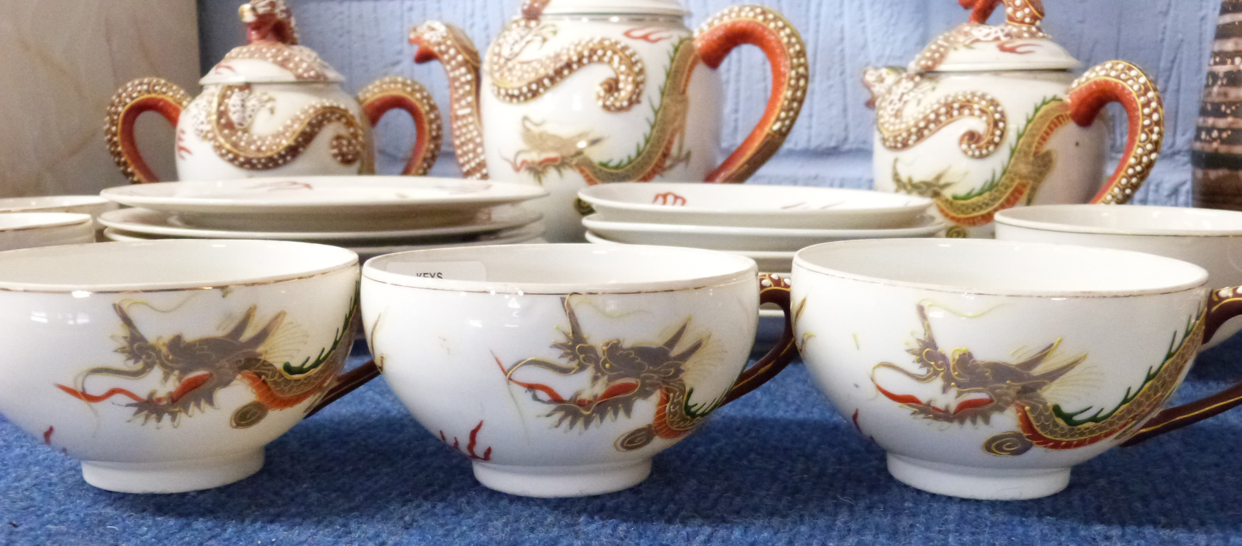 Mid-20th century Japanese porcelain tea set, the cups with a lithophane of a geisha girl in the - Image 3 of 4