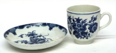 18th century Worcester cup with a printed floral design, together with a similar saucer (2)