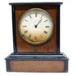 Late 19th century mantel clock with a light oak veneered design on rectangular base