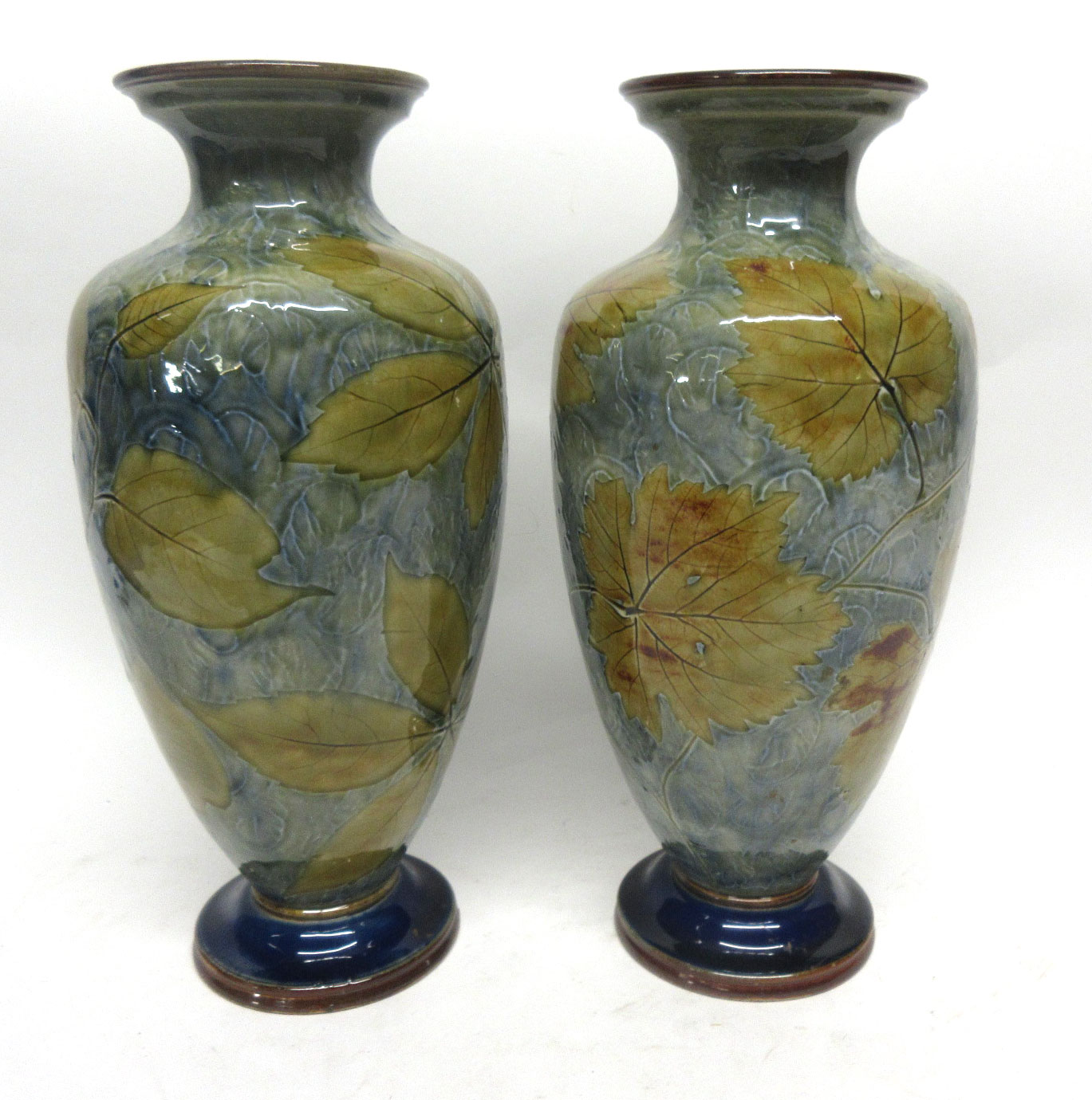 Pair of Royal Doulton natural foliage ware vases, 32cm high (2)