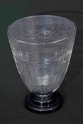 Art Deco glass vase of flared form on stepped purple base, decorated with stylised leaves in relief,