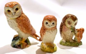 Group of two Beswick owls and a further Beatrix Potter Beswick figure of Old Mr Brown (3), largest