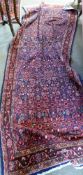 Persian Sarouk long wool runner, all over geometric and floret design in red, blue and pink, 281cm x