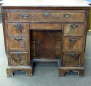 Late 18th/early 19th century small walnut veneered desk with cross banded top over a single long