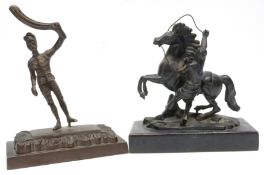 Two bronzed metal sculptures, one of a Hussar on rectangular base, the other of a Roman warrior with