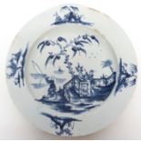 Lowestoft porcelain plate, the centre with a chinoiserie design of man fishing, the border with