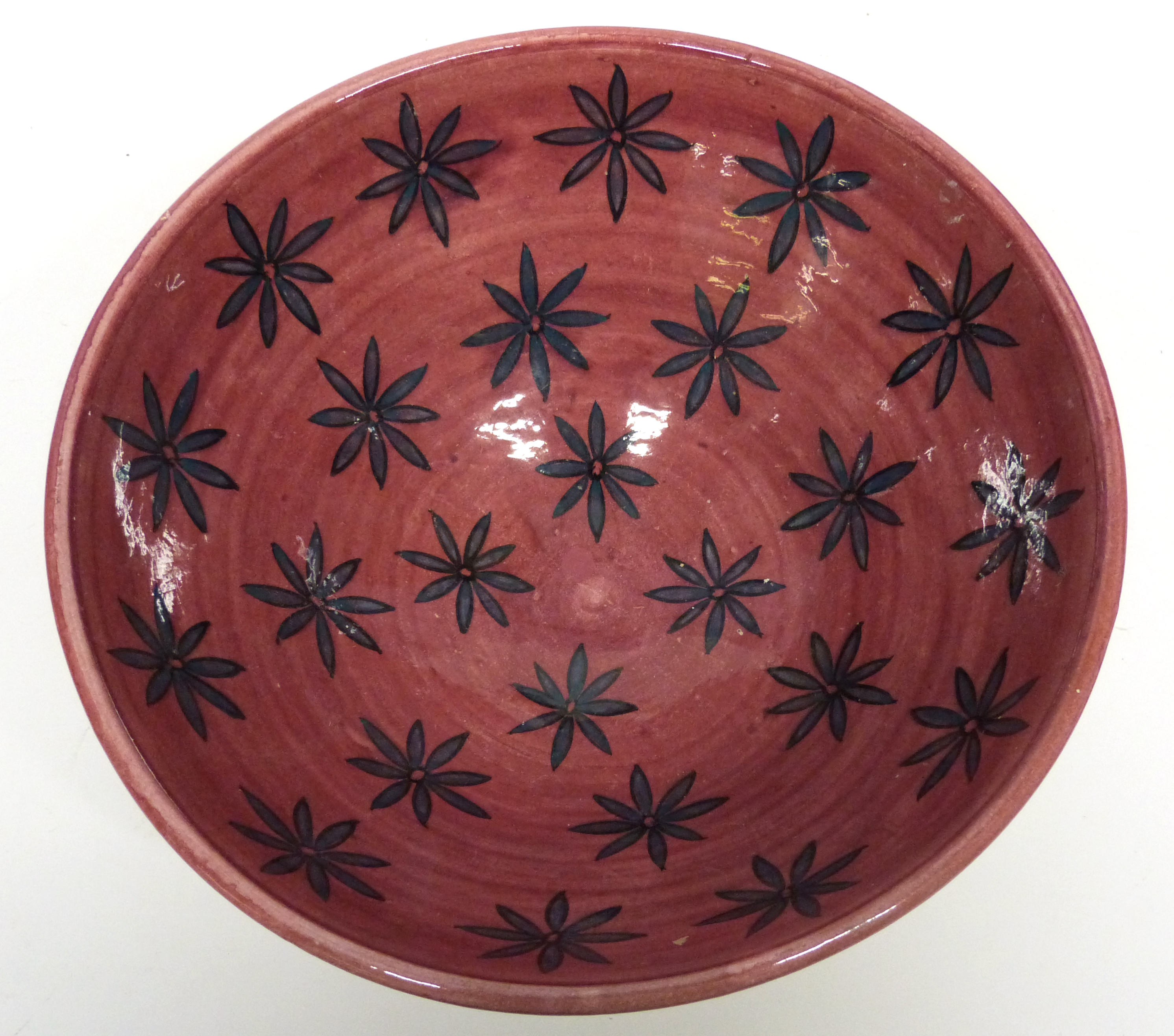 Safi Middle Eastern bowl, the interior with a red glazed star design, 26cm diam