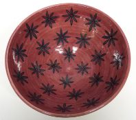 Safi Middle Eastern bowl, the interior with a red glazed star design, 26cm diam