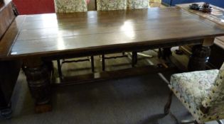 Good quality Elizabethan style heavy carved oak refectory dining table supported on four heavily