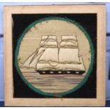 Embroidered picture of a ship in wooden frame