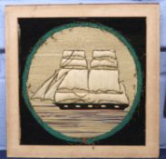 Embroidered picture of a ship in wooden frame