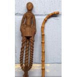 Unusual wooden walking stick, possibly African, modelled with a lady as the handle, together with