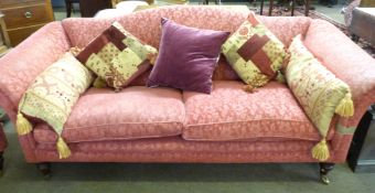 Mark Elliot contemporary pink/burgundy fabric covered three-seater sofa with serpentine back,