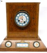 Sevres style clock with dial and inset into a light oak wooden frame, etched with an Art Nouveau