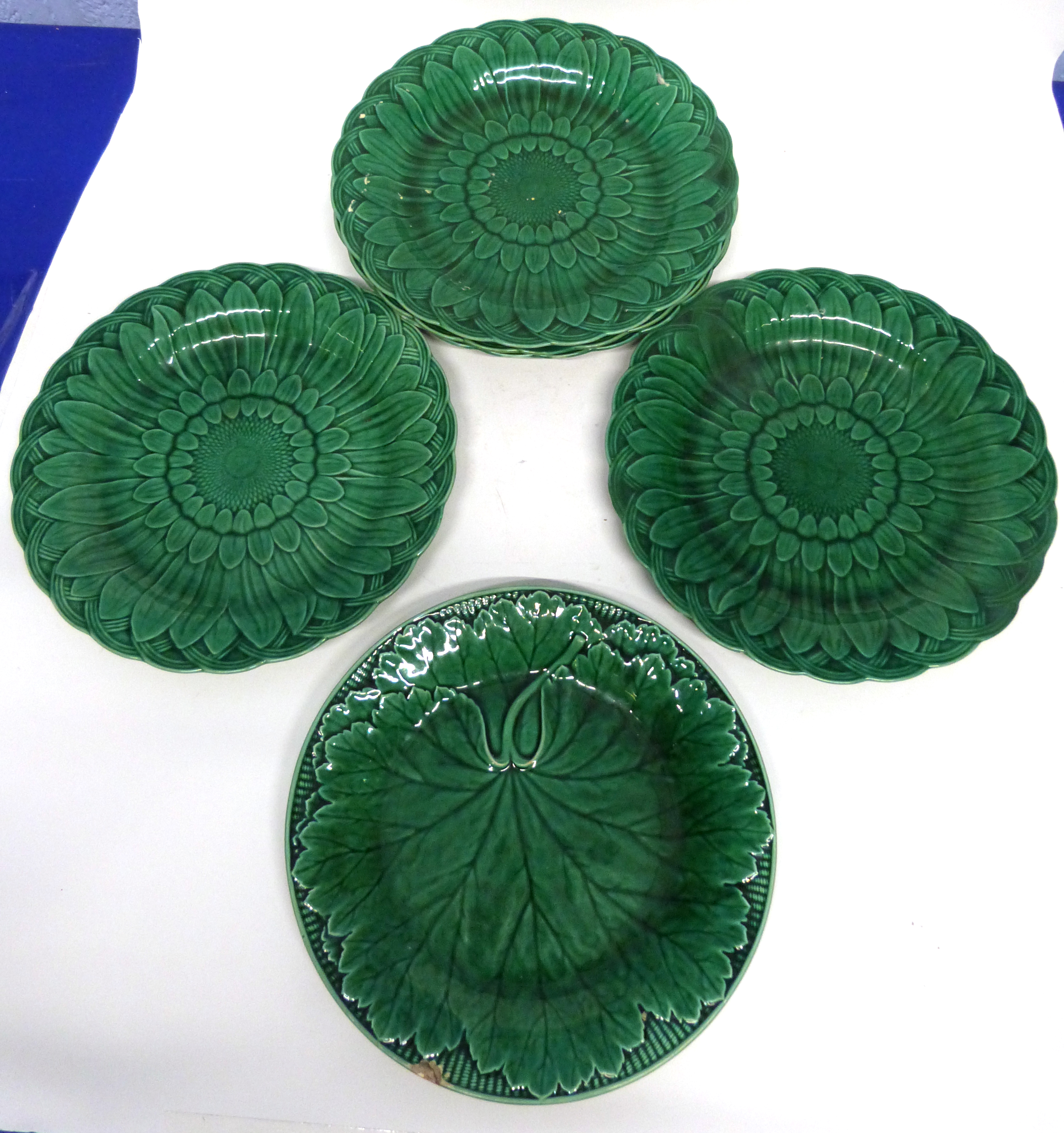 Group of green glazed 19th century Wedgwood plates with various floral designs, comprising 7