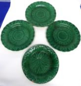 Group of green glazed 19th century Wedgwood plates with various floral designs, comprising 7