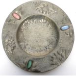 Small metal dish with planished effect, inset with stones in Art Nouveau style, 18cm diam