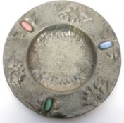 Small metal dish with planished effect, inset with stones in Art Nouveau style, 18cm diam