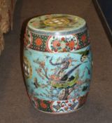 Chinese porcelain garden seat with polychrome decoration of birds amongst foliage with panels